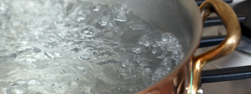 Why Does a Wooden Spoon Stop Water from Boiling Over? Find Out!